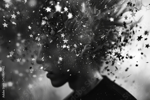 An abstract image of a person with a headache, their head surrounded by a series of stars. The stars symbolize the disorienting effect of a severe headache photo