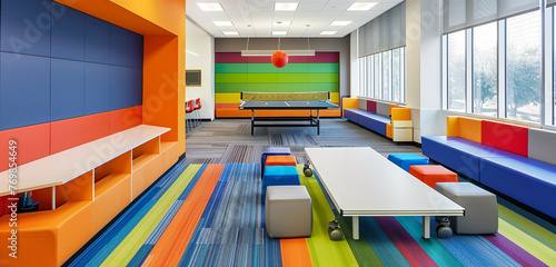 A lively breakout space including adjustable seating, colored accent walls, and a ping pong table for last-minute games and team-building exercises