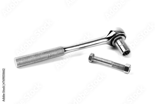 A socket wrench and ratchet handle with a machine bolt and nut isolated on white © SockaGPhoto