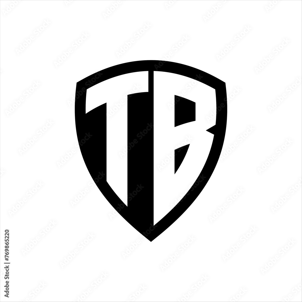 TB monogram logo with bold letters shield shape with black and white color design TB monogram logo with bold letters shield shape with black and white color design