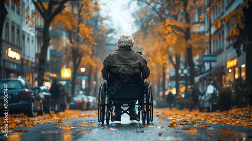 A disabled man in a wheelchair in traffic photo