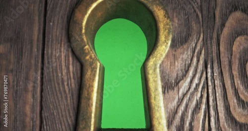 Wallpaper Mural Close up of door with keyhole, flies through keyhole with green screen. Peek, look in old keyhole to know secrets inside. Concept of open lock, entrance exit  Torontodigital.ca