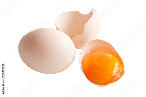 Broken egg and egg yolk close up photo isolated on transparent background, png file