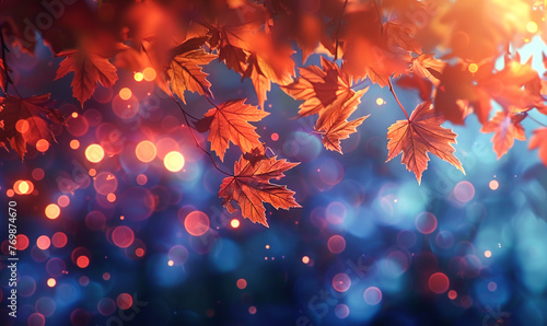 abstract background with bokeh effects accentuated by vibrant orange maple leaves © SOLO PLAYER