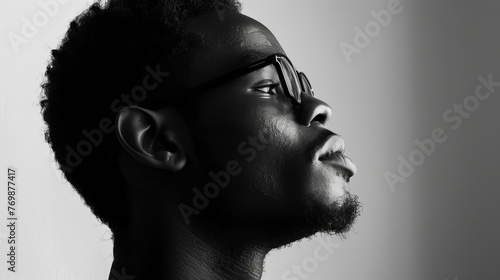 Pensive African American Man, Side Portrait, Black and White Photography