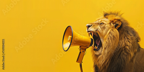 Lion roaring on amegaphone. Advertisement concept with wide copy space for text. 