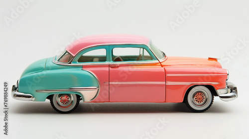 A compact brightly colored vintage car figurine