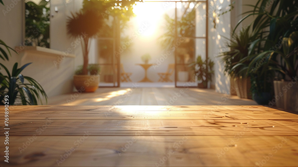 The elegant simplicity of an empty wooden table contrasting with a gently blurred