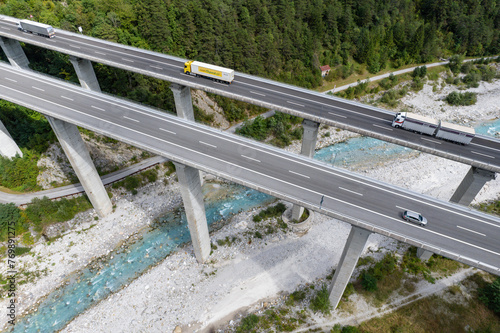 Highway in the mountains of Italy - Aerial view of toll highway passing through the Italian Alps