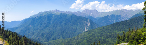view of the Caucasus Mountains in summer on sunny clear day - panorama