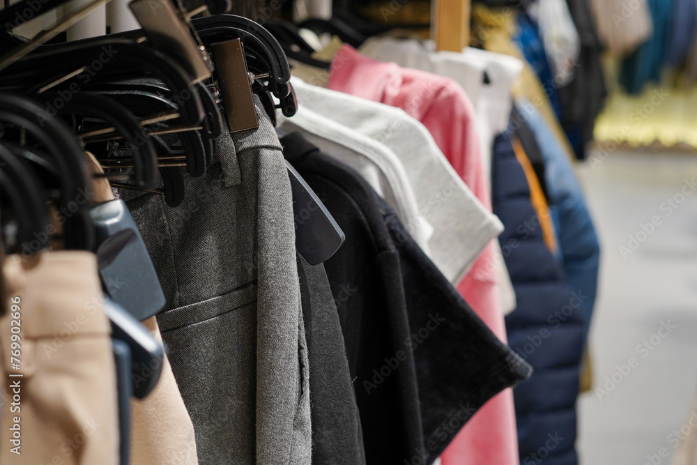 Naklejka premium A second hand clothes shop in the center of the city with a lot of clothes