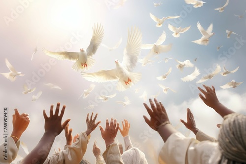 People releasing white doves for peace photo