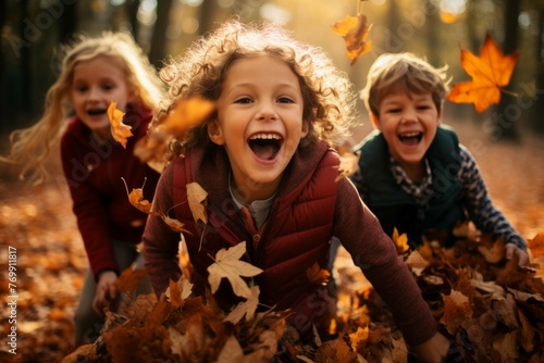 Children playing in a pile of colorful autumn leaves