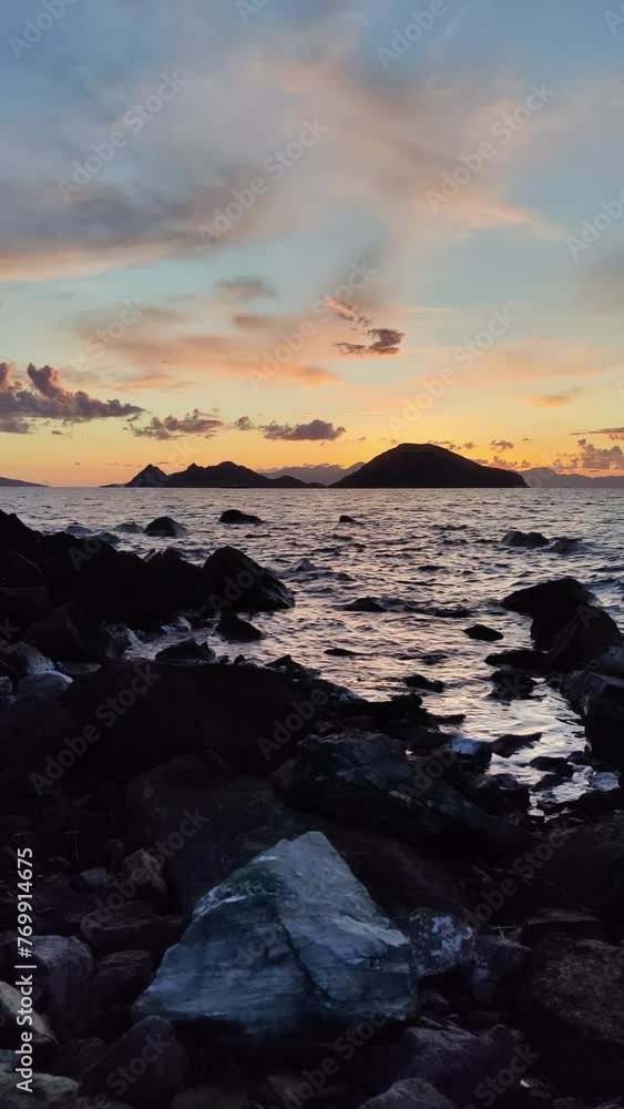 Seaside town of Turgutreis and spectacular sunsets. Bodrum, Turkey. Vertical video for social media.
Seaside town of Turgutreis and spectacular sunsets. Bodrum, Turkey. Vertical video for social media.