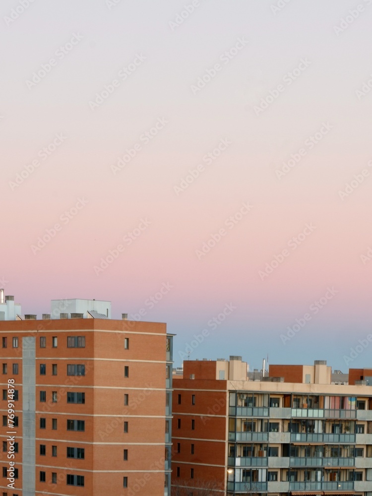Aerial view on modern apartment buildings in condo neighbourhood against vivid sky in Zaragoza, Spain