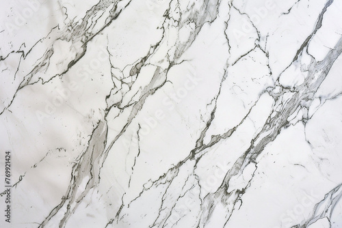  A high-definition image capturing the elegance of white marble, with faint wisps of gray veining swirling across its surface. 