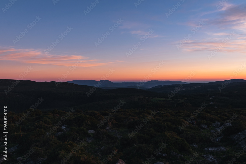 Panoramic view of the silhouette of the mountains against the sky at sunset. Galicia - Spain Panoramic view of the silhouette of the mountains against the sky at sunset. Galicia - Spain
