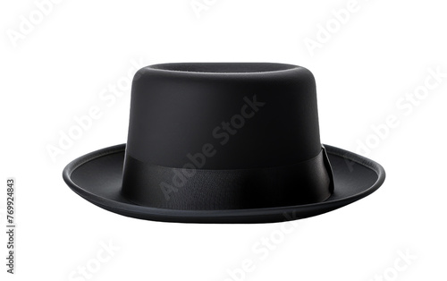 A solitary black top hat stands against a stark white backdrop