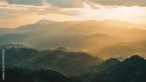 Golden Hour Over Layered Mountain Landscape at Sunset