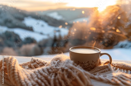 A cup of hot coffee with milk on the table, a winter landscape outside the window