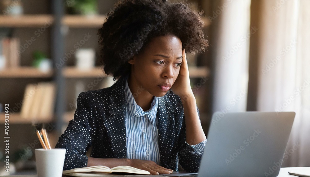 Young woman looking at laptop screen in despair, unemployed female looking through job hunting sites unsuccessfully, frustrated female freelancer fails Young woman looking at laptop screen in despair, unemployed female looking through job hunting sites unsuccessfully, frustrated female freelancer fails