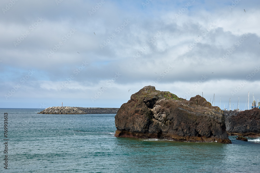 Fototapeta premium View of the volcanic rocks from the beach of Vila Franca do Campo in San Miguel, Azores, Portugal