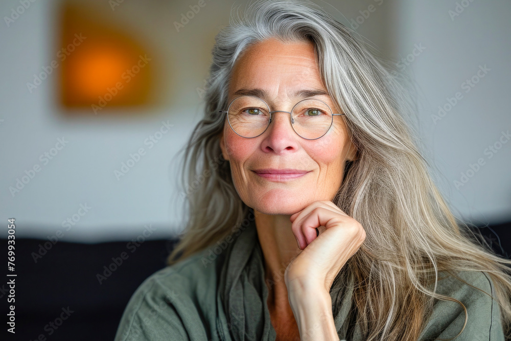 Senior woman smily face wears round glasses thick grey hair Senior woman smily face wears round glasses thick grey hair