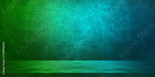 gradient studio background in green and blue neon color tone. leather texture backdrop for design. space for selling products on the website. green, cyan, blue banner background for advertising. © WONGSAKORN