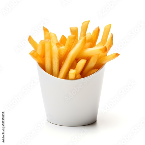 Crispy golden French fries in a white container on a white background