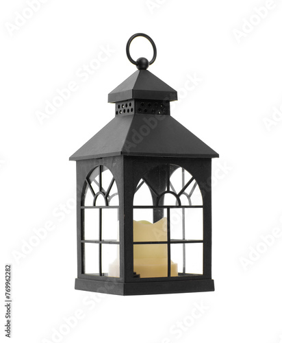 black christmas decorative vintage lantern with candle isolated on white background © serikbaib