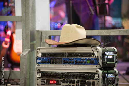 
Cowboy hat resting on top of a mixer at a country festival photo