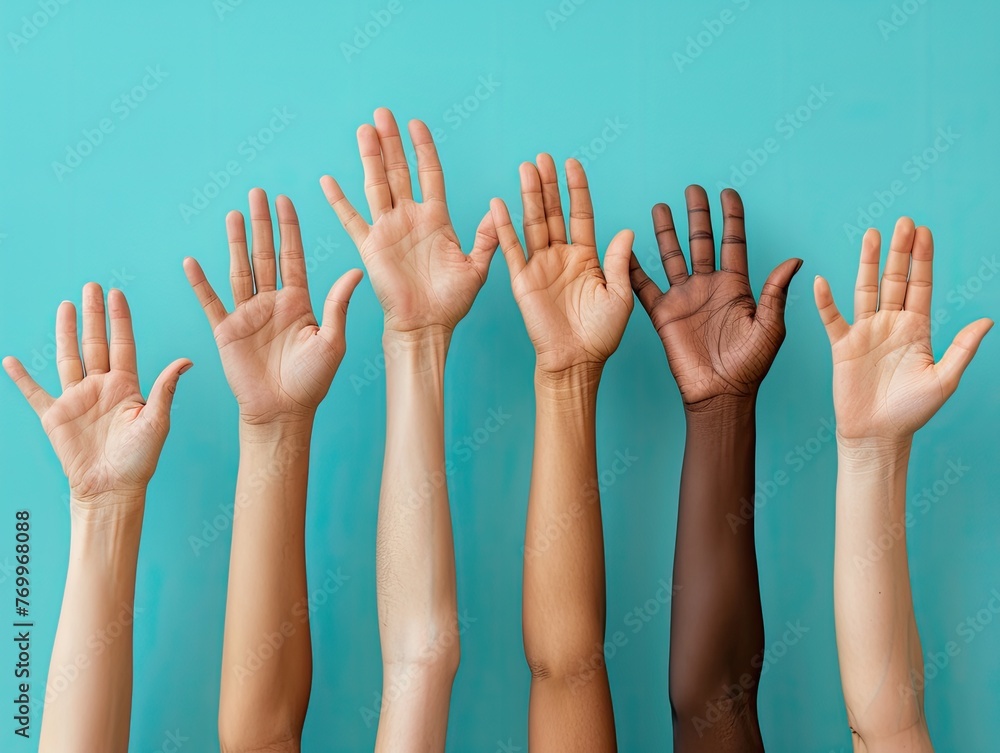 Hands of diverse group of people raised and united in the air, symbolizing collaboration and teamwork - Unity and cooperation - Soft and diffused studio lighting - Inspirational and inclusive style 