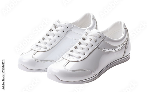 A pair of white shoes delicately placed on a white background