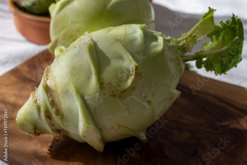 Heads of fresh ripe bio white cabbage kohlrabi from organic farm  close up