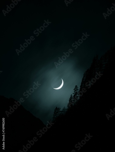 photo of moon on a dark sky 