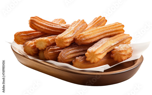 A tray filled with golden churros arranged on a pristine white background