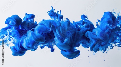 blue ink floating on white background