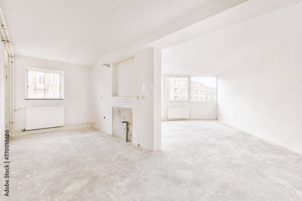 Empty white room in need of renovation Empty white room in need of renovation