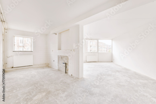 Empty white room in need of renovation