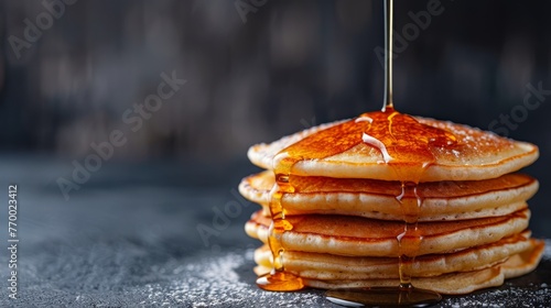 Stack of Pancakes With Syrup Pouring photo