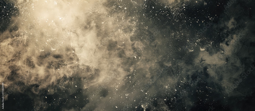 Fototapeta premium A closeup view of a cloudy sky filled with smoke, creating a dramatic meteorological phenomenon. The landscape below is covered with grass and soil