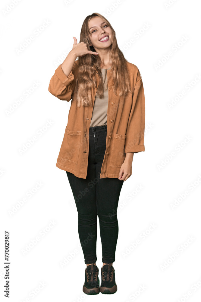 Studio portrait of a blonde Caucasian woman showing a mobile phone call gesture with fingers. Studio portrait of a blonde Caucasian woman showing a mobile phone call gesture with fingers.