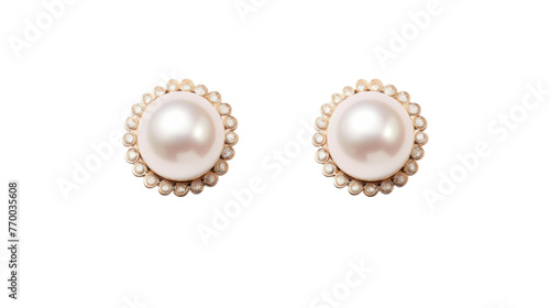 A delicate pair of pearl earrings gleam and dance under the light, showcasing their timeless beauty
