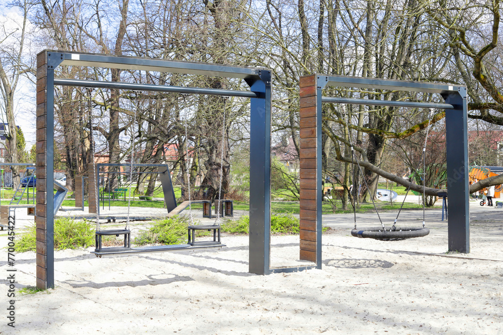 KRAKOW, POLAND - MARCH 19, 2024: A modern, minimalist playground for children. KRAKOW, POLAND - MARCH 19, 2024: A modern, minimalist playground for children.