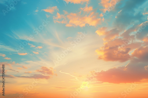 Beautiful sky with sunset and cloud background, blue sky with soft pastel colors of orange © Cetin