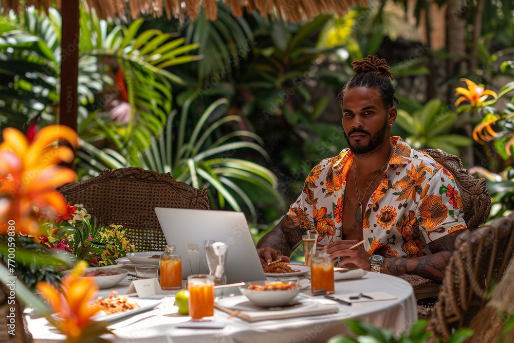 Man Working on Laptop at Table Man Working on Laptop at Table