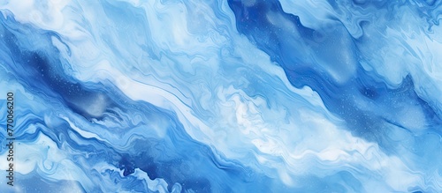 A close up of a blue and white marble texture resembling a swirling cloud formation in the sky. The electric blue pattern resembles a wind wave in a natural landscape