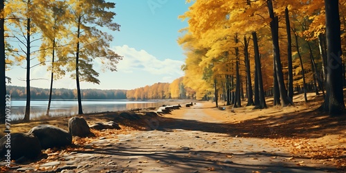 Autumn landscape. Path in the forest on the lake shore.