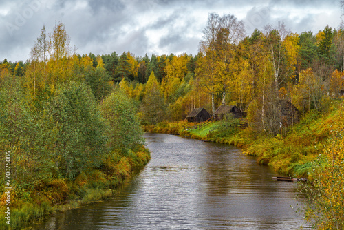 Forest landscape and lake in the northern regions of Russia in late autumn.