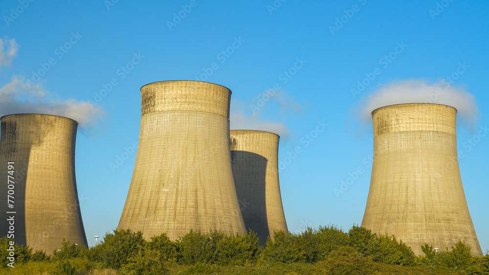 Enormous steaming cooling towers of a coal fired power station in Ratcliffe Enormous steaming cooling towers of a coal fired power station in Ratcliffe
